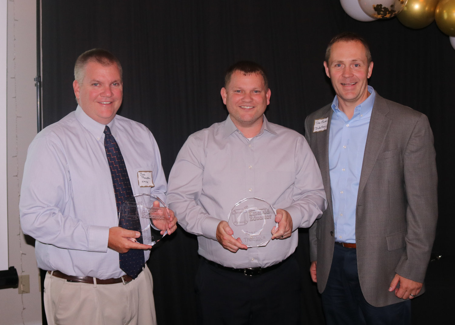 Josh Thompson from North Montgomery High School, left, and Reasley Thompson from Southmont High School, center, received Emerald Educator awards. Gary Linn of Crawfordsville High School was the third recipient, but was unable to attend the awards ceremony.
