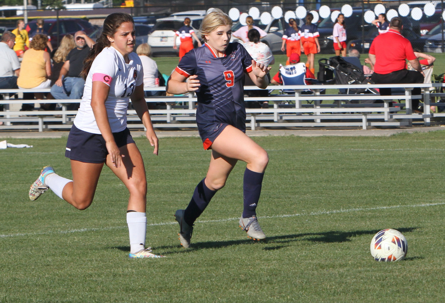 Marissa Moffit fights for possession for the Chargers.