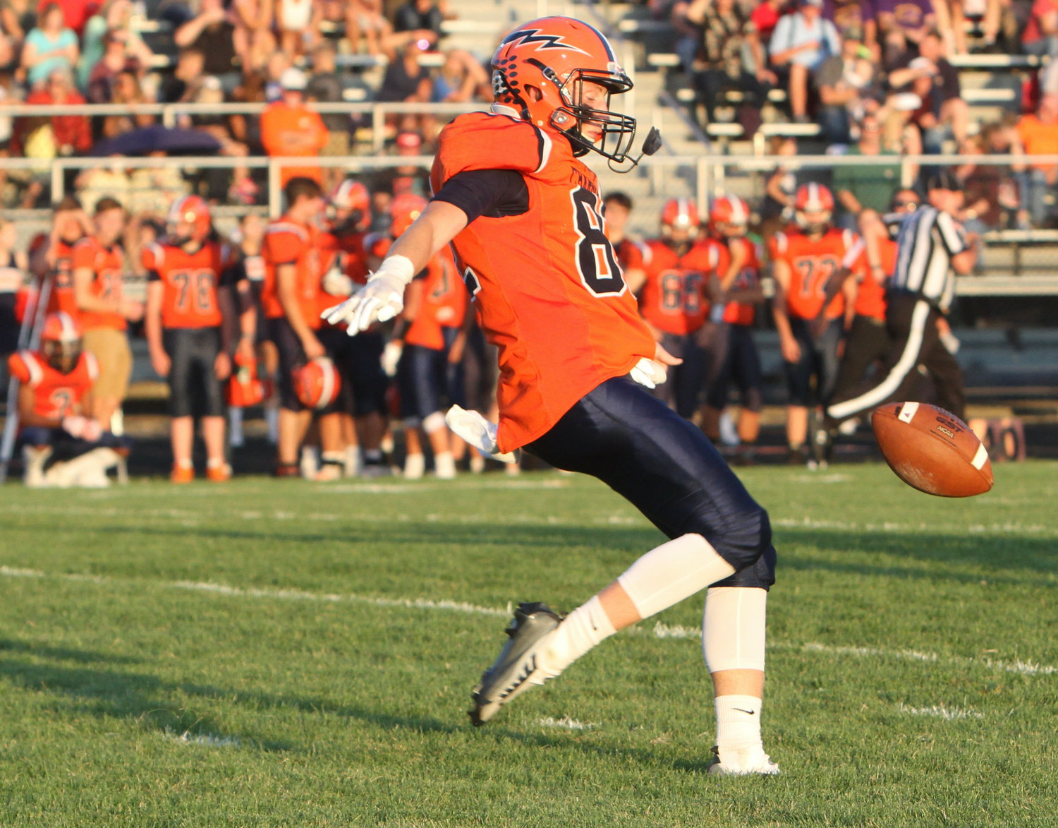 Jarrod Kirsch punts the ball away to the Tigers.