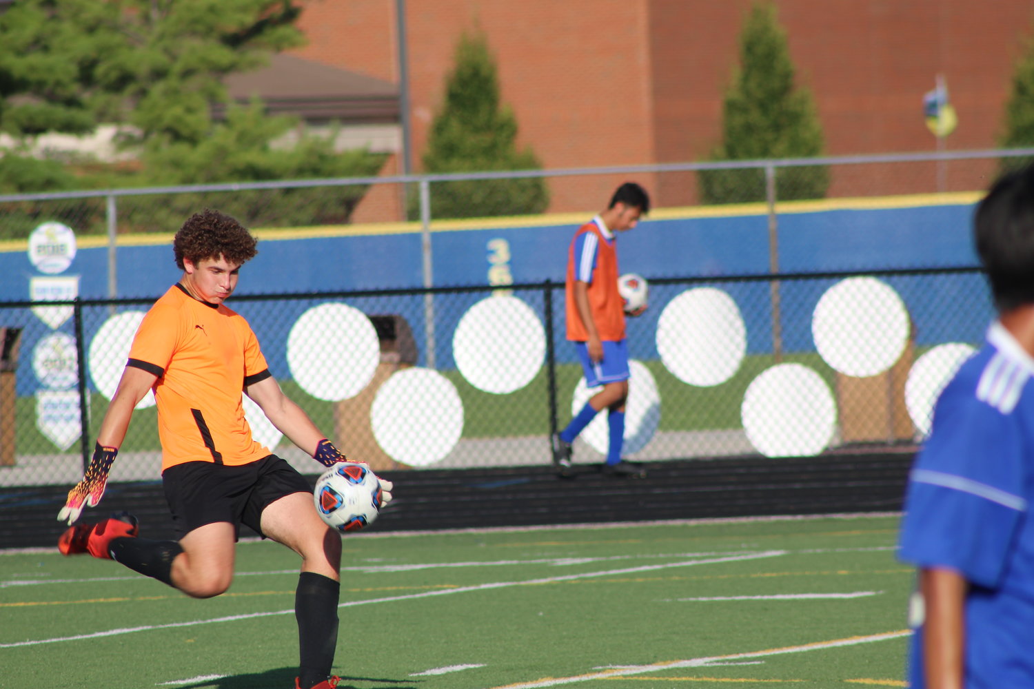 Sophomore goalkeeper Alec Saidian booms a kick downfield.