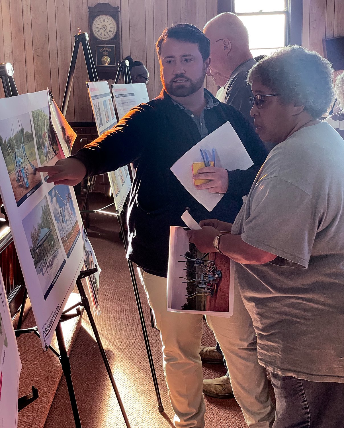 Eric Walker, a landscape architect with HWC, points out a feature planned for the renovated Frances Wooden Northside Park.