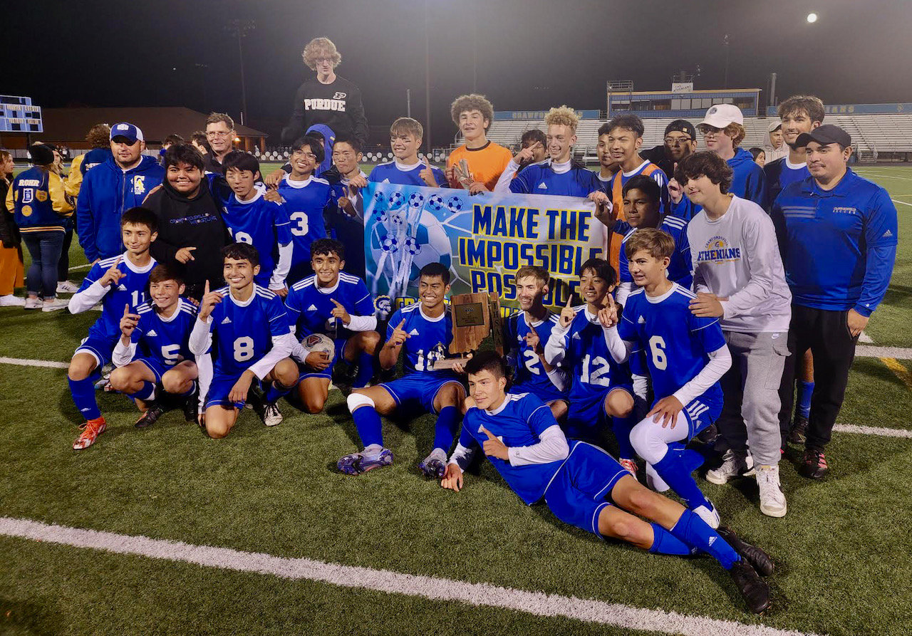 Crawfordsville boys soccer celebrates their 4-3 sectional championship win over Cascade on Saturday night. It’s the Athenians first sectional title since 2016.