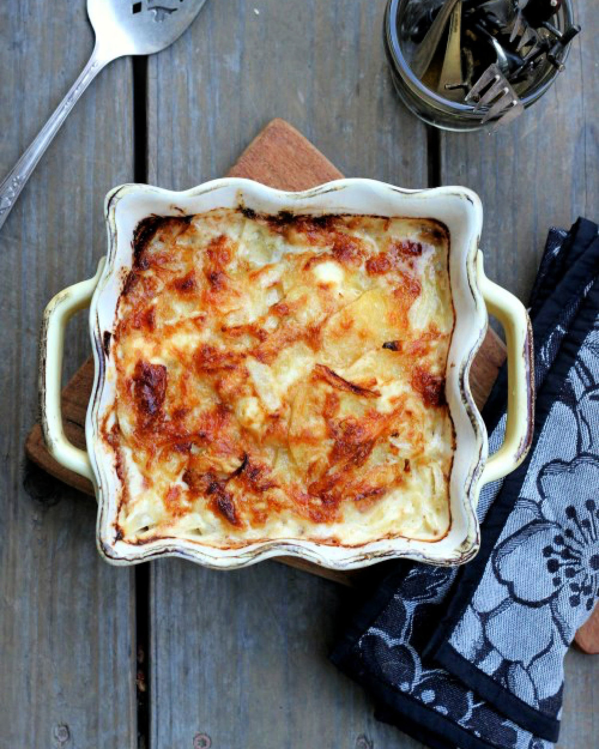 A potato gratin is a cheese lover’s gift, with ultrathin layers of sliced potatoes blanketed in oozing cheese, cream and, yes, more cheese.