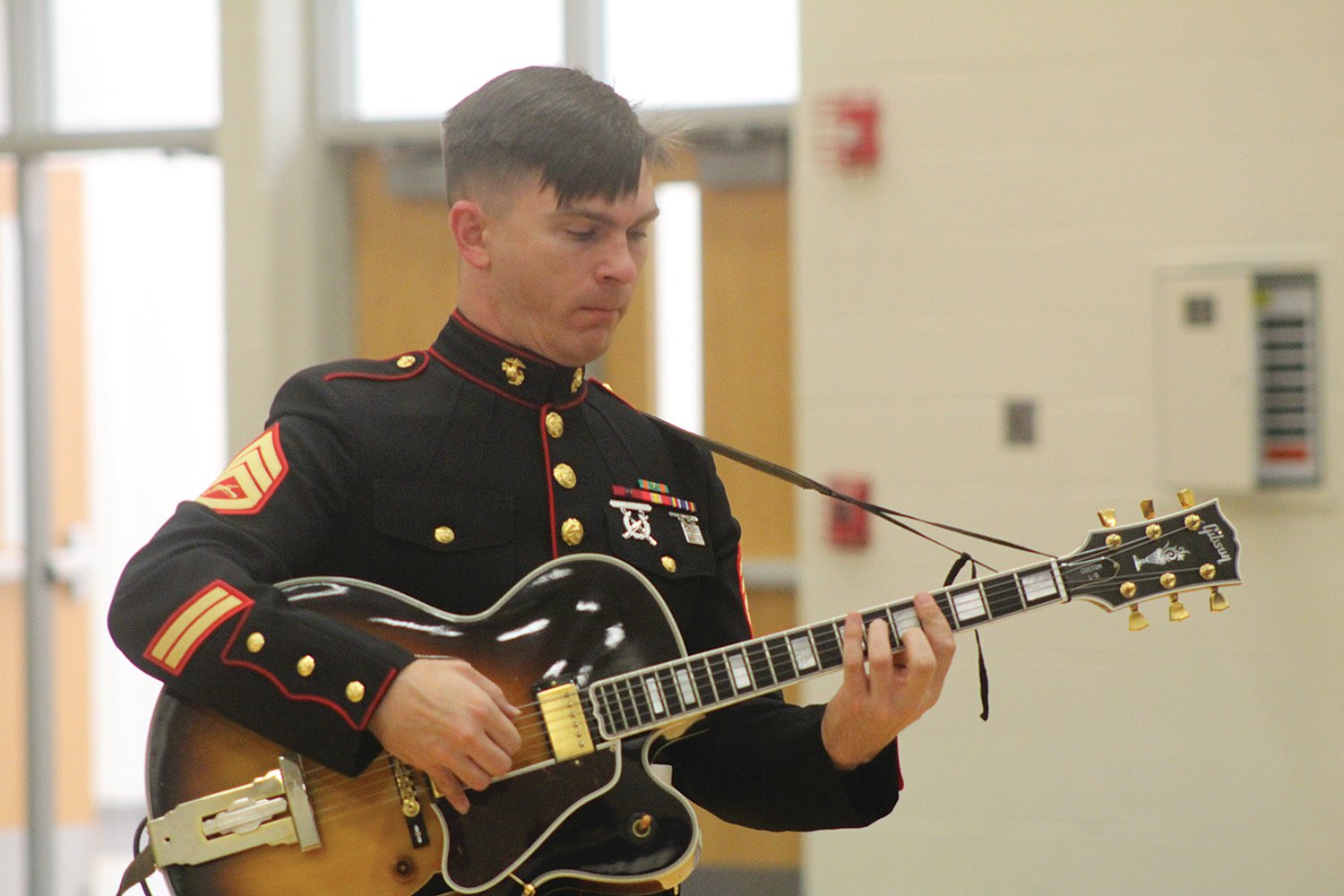 Staff Sgt. Neil Egan and his guitar provided the band with a steady sound.