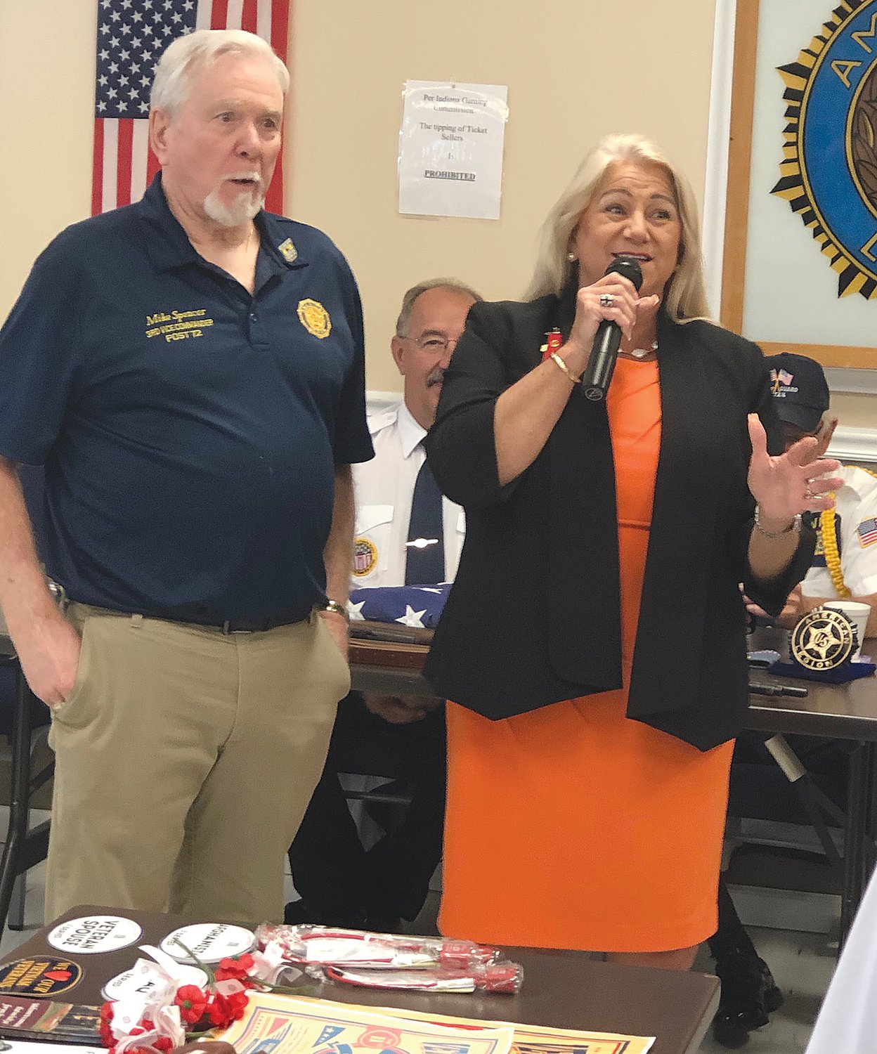 Jill Fewell, right, executive director of the Welcome Home Vietnam Veterans, thanks Mike Spencer for organizing the Veterans Expo.