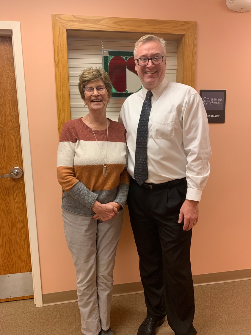 David W. 
Johnson, the newly selected clinic CEO, poses with Nancy Sennett, longtime clinic board member.
