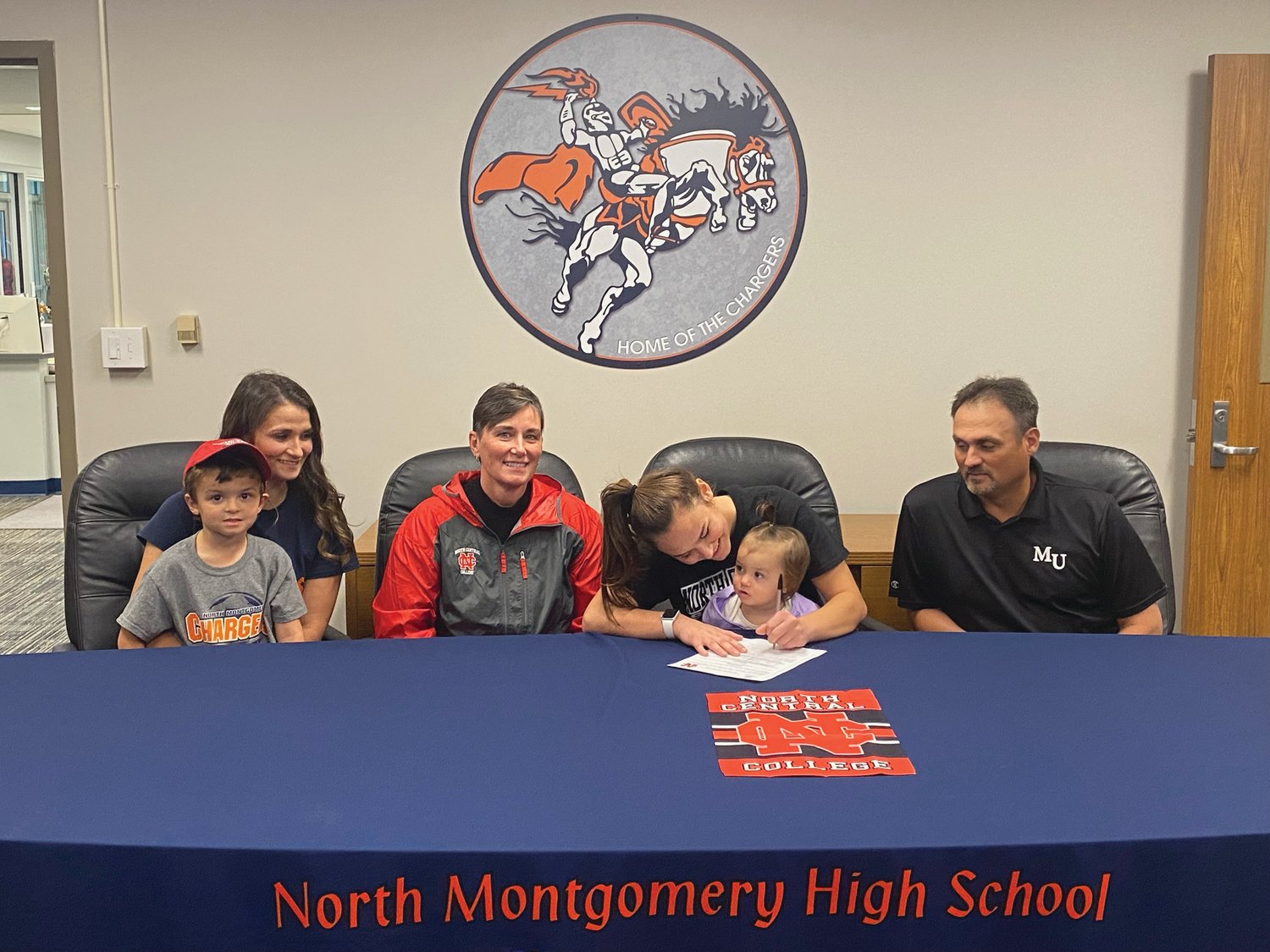 North Montgomery all-time goal scorer Teegan Bacon officially signed with Division III North Central College on Wednesday.