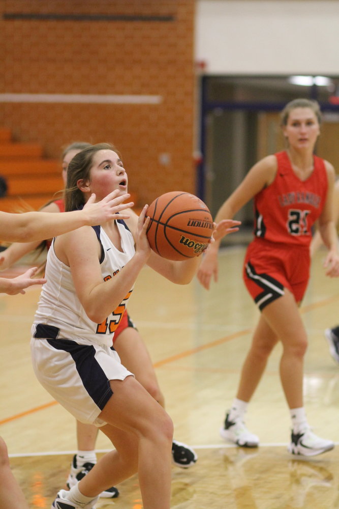 Freshman Macee Norman stepped up in a big way for North Montgomery on Friday scoring a game-high 22 points to help secure the Chargers first win of the season in a 50-45 win over Attica.
