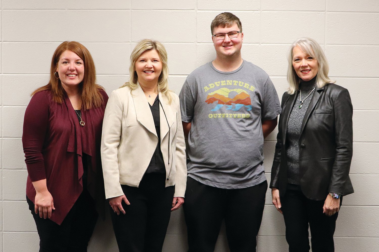 Montgomery County Community Foundation representatives pictured with Gabriel Little are, from left, Sarah Storms, Kelly Taylor, and Debbie Schavietello.