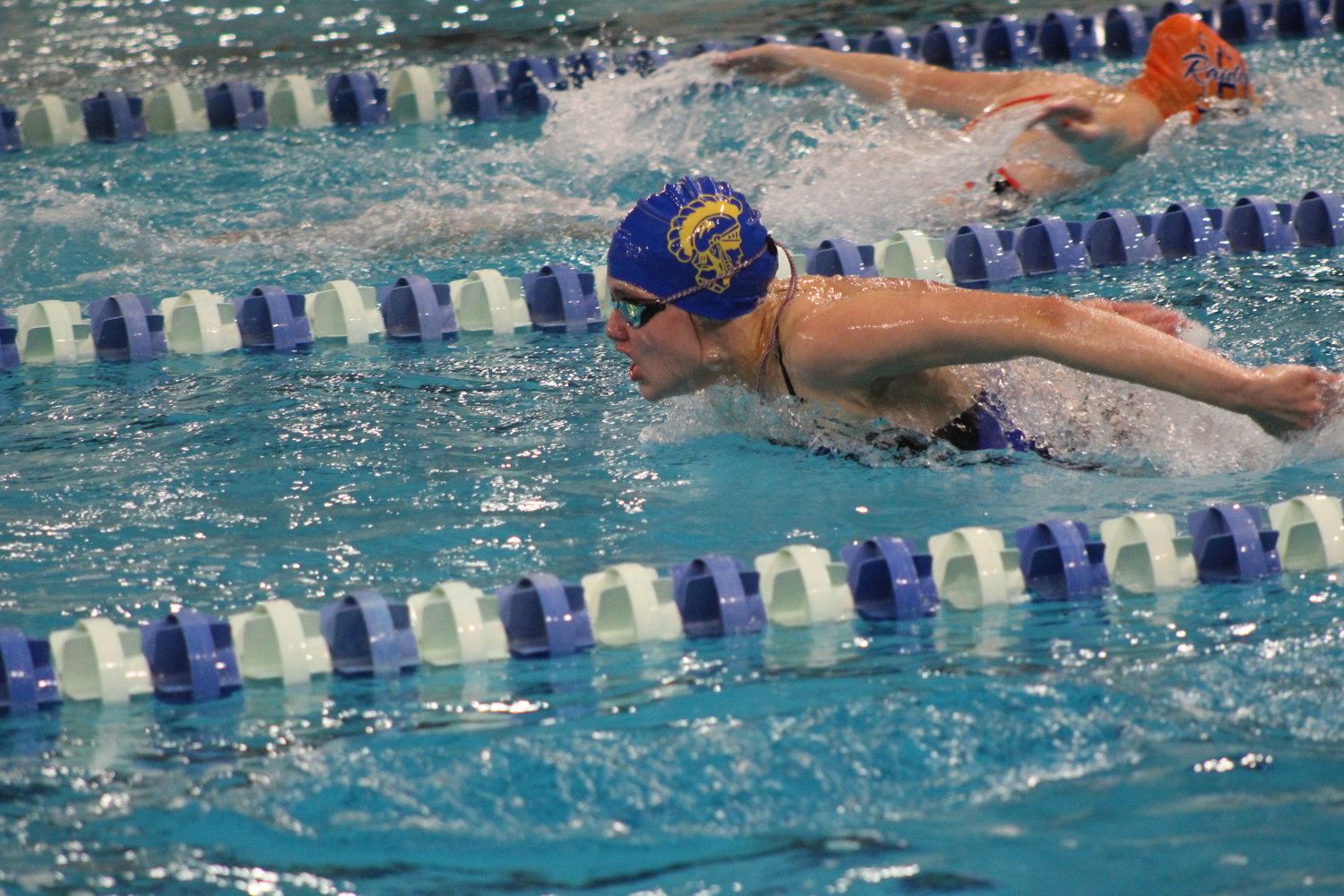 Sophia Melevage swims the butterfly during the Athenians meet vs Harrison on Tuesday.
