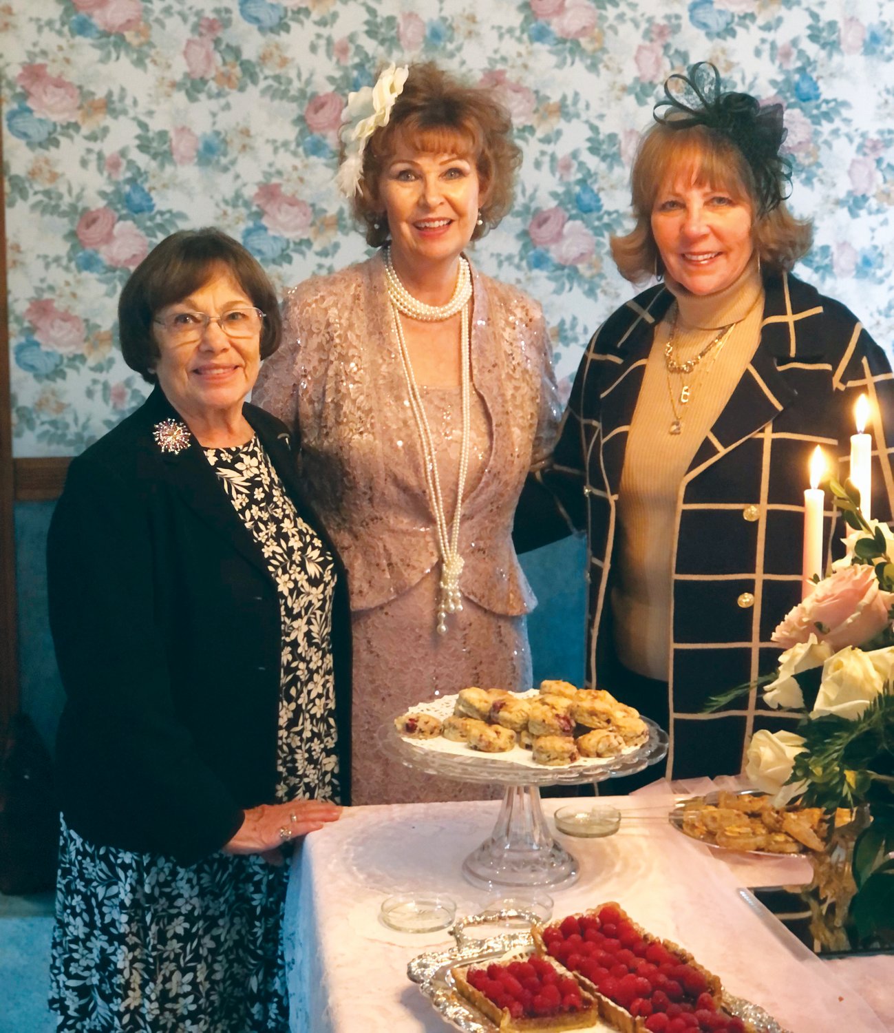 Local DAR members are, from left, treasurer Rachel Brown, Regent of Society Michelle Bolden and Vice Regent Susan Fisher during the chapter's 125th anniversary tea at the DAR house.