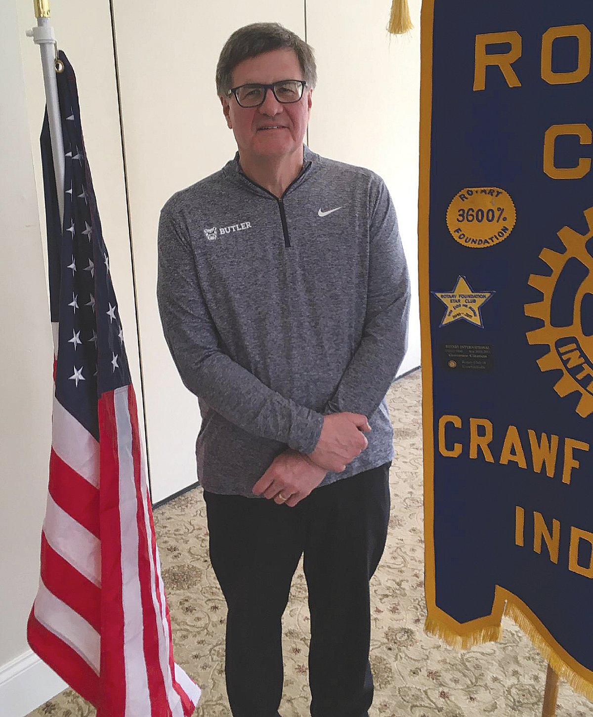 Dave Peach, general manager of the three radio stations in Crawfordsville, spoke to the Crawfordsville Rotary Club at their weekly meeting. Peach is also the public address announcer for the Butler University Men's Basketball games. He started in radio in 1978 and started to work for Butler in 1979 when Tony Hinkle was coaching football, baseball and basketball at the college. He brought a bobble head of Tony Hinkle to show the Rotarians. Peach shared many stories about his time at Butler and shared his wardrobe of shirts he has worn every time he was broadcasting. In 1884, WabashCollege played its first football game with Butler. (No, he didn't announce that game.) On Sept. 15 you can hear Peach announcing the Wabash vs. Butler Football Game from Butler. When Peach is at the radio stations in Crawfordsville he tries to present local activities and sports for his listeners. "Always Be Ready" is his motto.