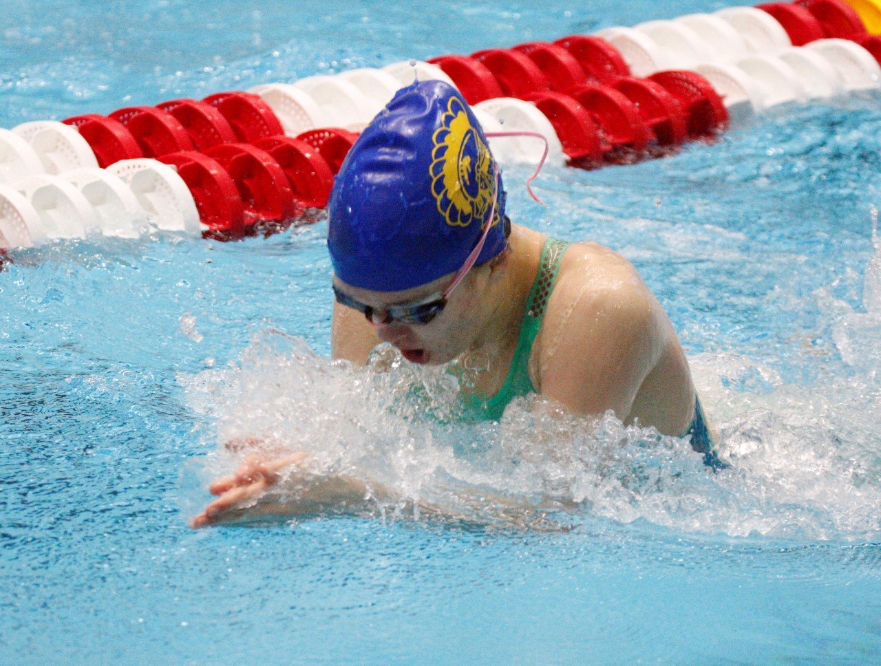 Guinevere Torbert-Schmitzer swimming the breaststroke.