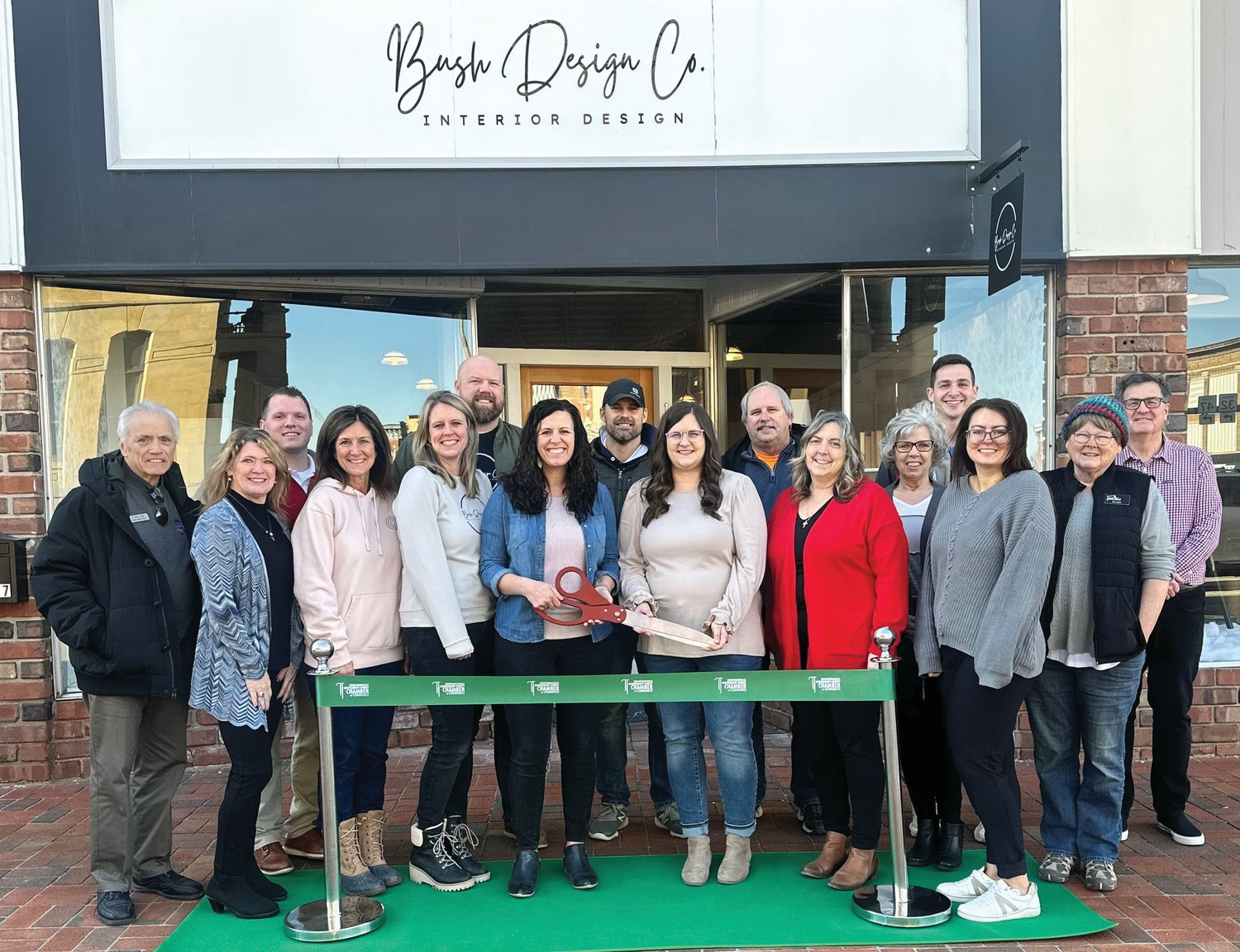 Katie Bush and Lindsey Emmert celebrated a ribbon cutting for their business, Bush Design Co., with members of the Crawfordsville/Montgomery County Chamber of Commerce.