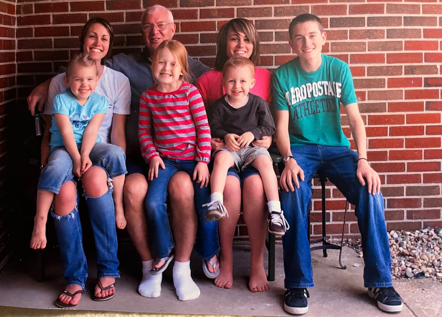 Schlicher with his 6 grandchildren.