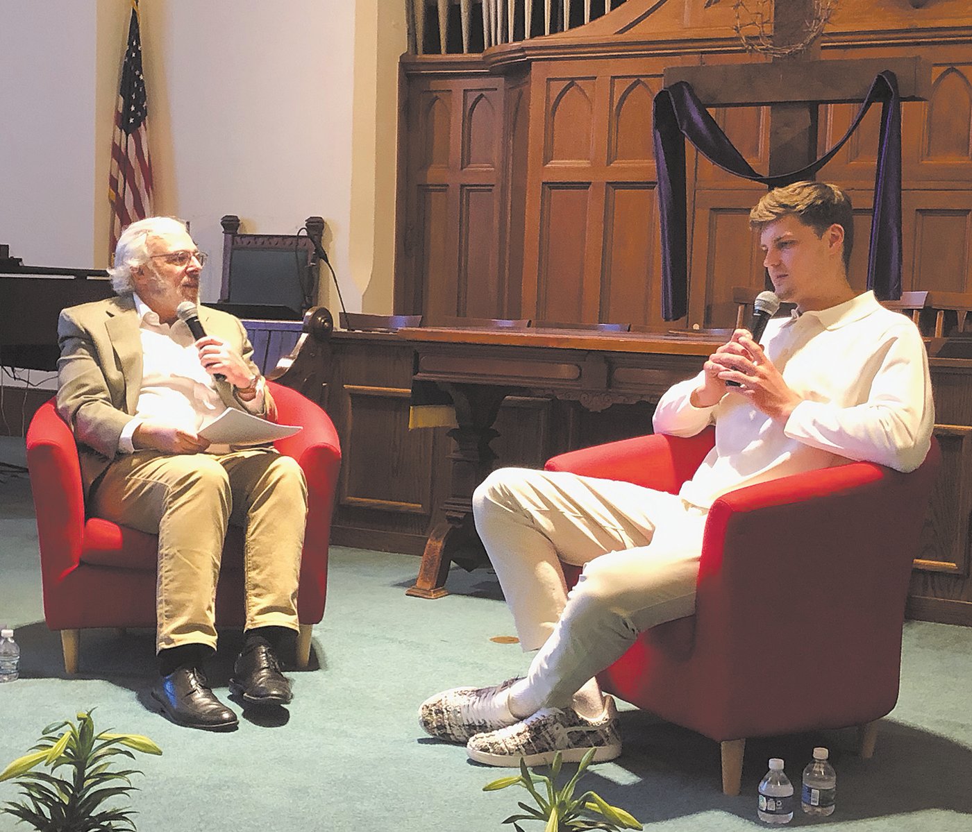 The Rev. John Van Nuys, left, talks Sunday with former Indiana University men's basketball player Miller Kopp about his athletic career and his faith at Wabash Avenue Presbyterian Church.