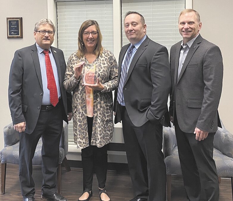 Pictured, from left, are Chuck Dixon, Marilyn Wehrman, Mike "Mitch" Mitchell and Rod Lasley, COO of Indiana Bankers Association.