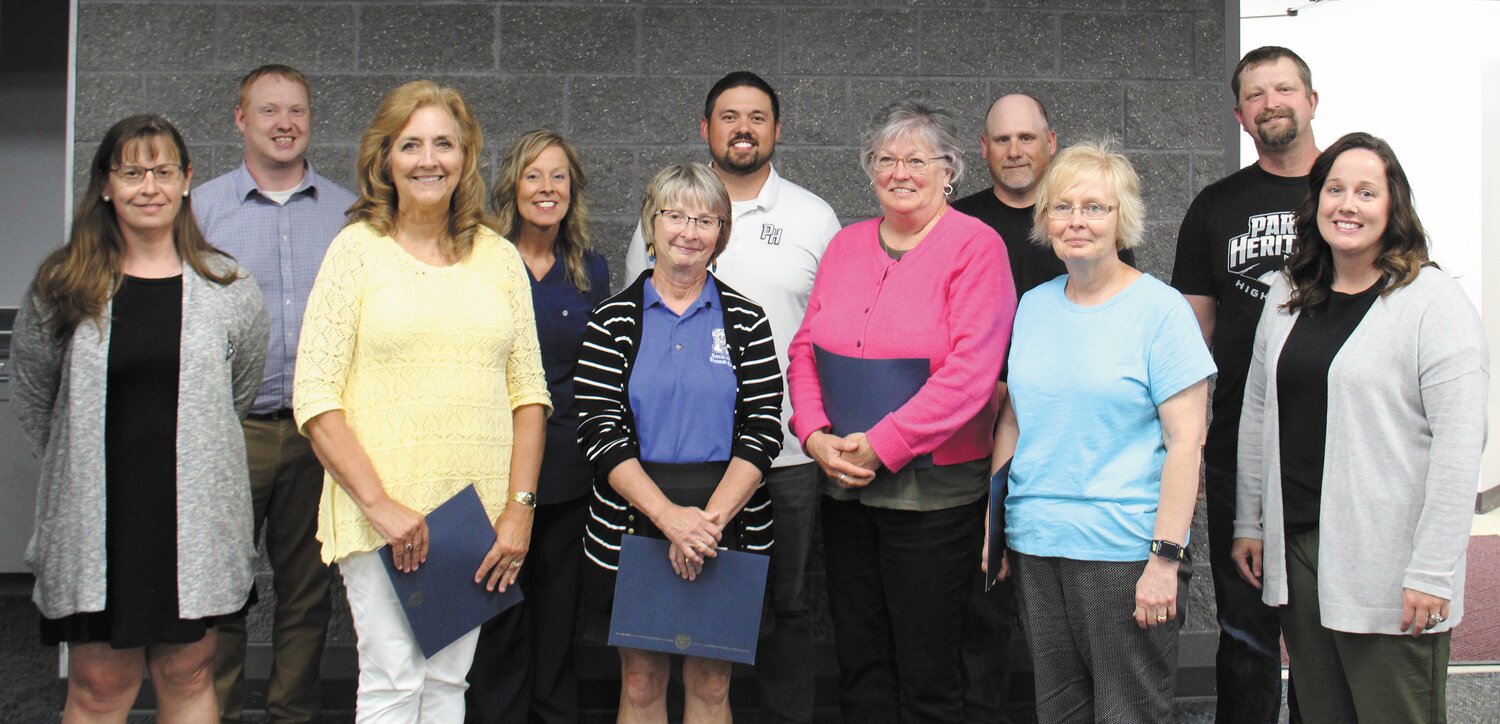 Retiring staff and school board members are front row, Elise Pratt, Karen Baxter, Sherri Paxton, Veronica Hill, Sue Lawson and Brandi Vandivier; and back row, Superintendent Mike Schimpf, Kim Cooper, Zach Clapp, Mark Graves and Scott Ramsay.