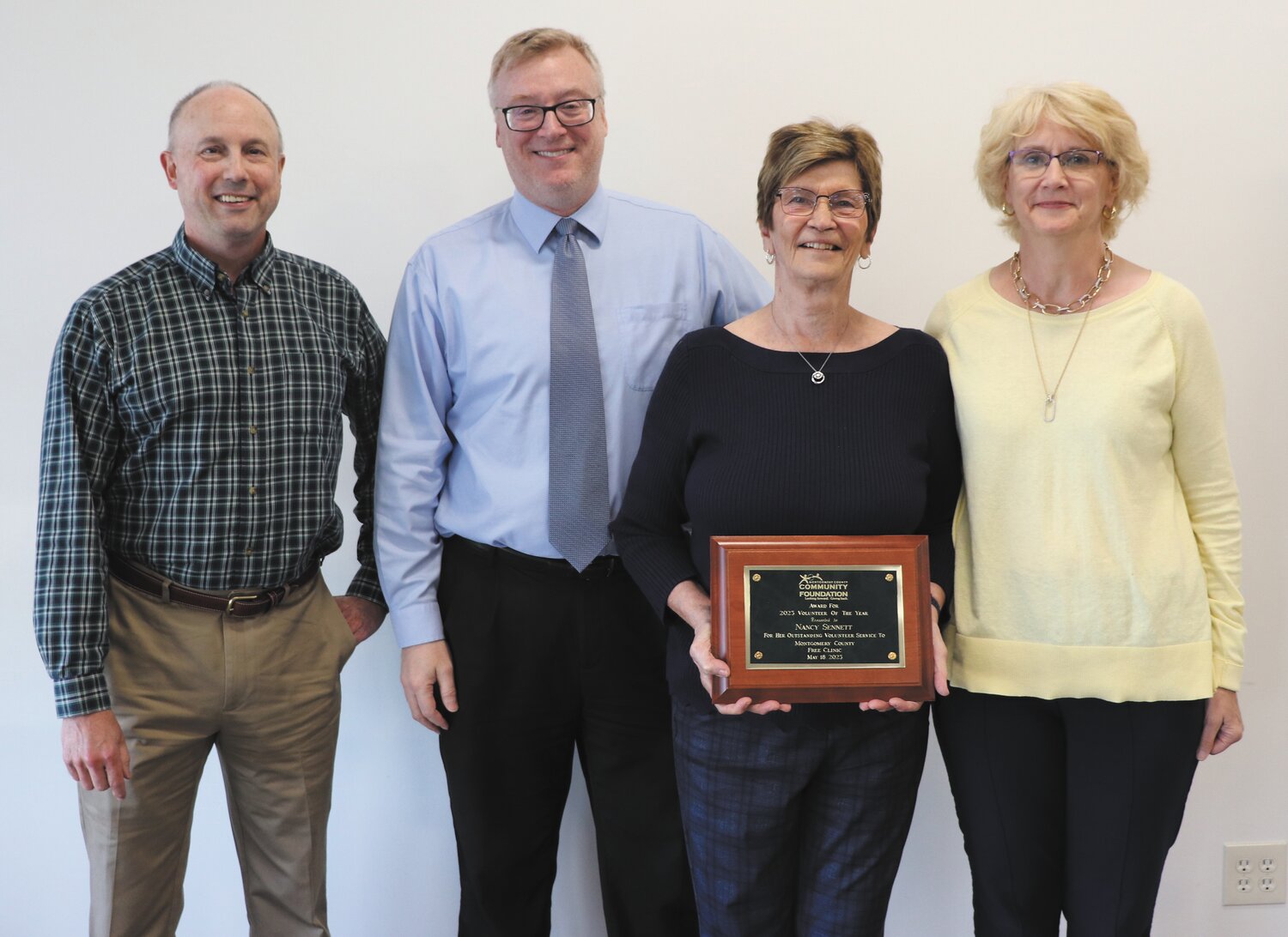 Nancy Sennett, second from right, was named MCCF’s 2023 Volunteer of the Year for her service to the Montgomery County Free Clinic. Pictured with her are, from left, Dr. John Roberts, Free Clinic board member and Chief Medical Officer, David Johnson, Executive Director, Sennett and Donna Hendrickson, board member.
