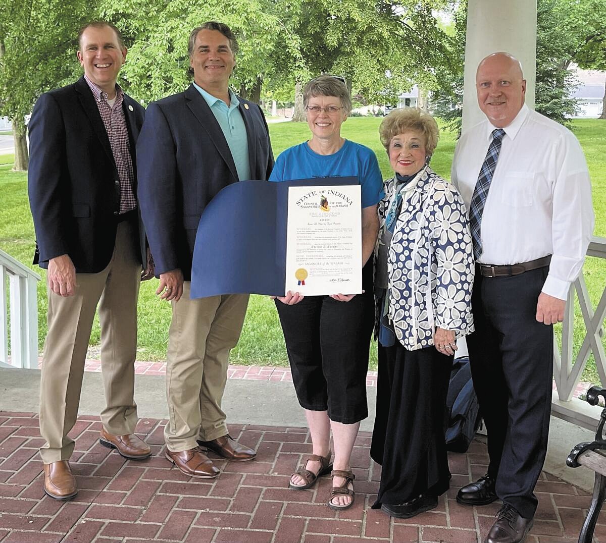 Therese Eutsler, center, was presented Monday with a Sagamore of the Wabash award. Pictured with her, from left, are State Rep. Beau Baird, State Sen. Brian Buchanan, State Rep. Sheila Klinker and Crawfordsville Mayor Todd Barton.