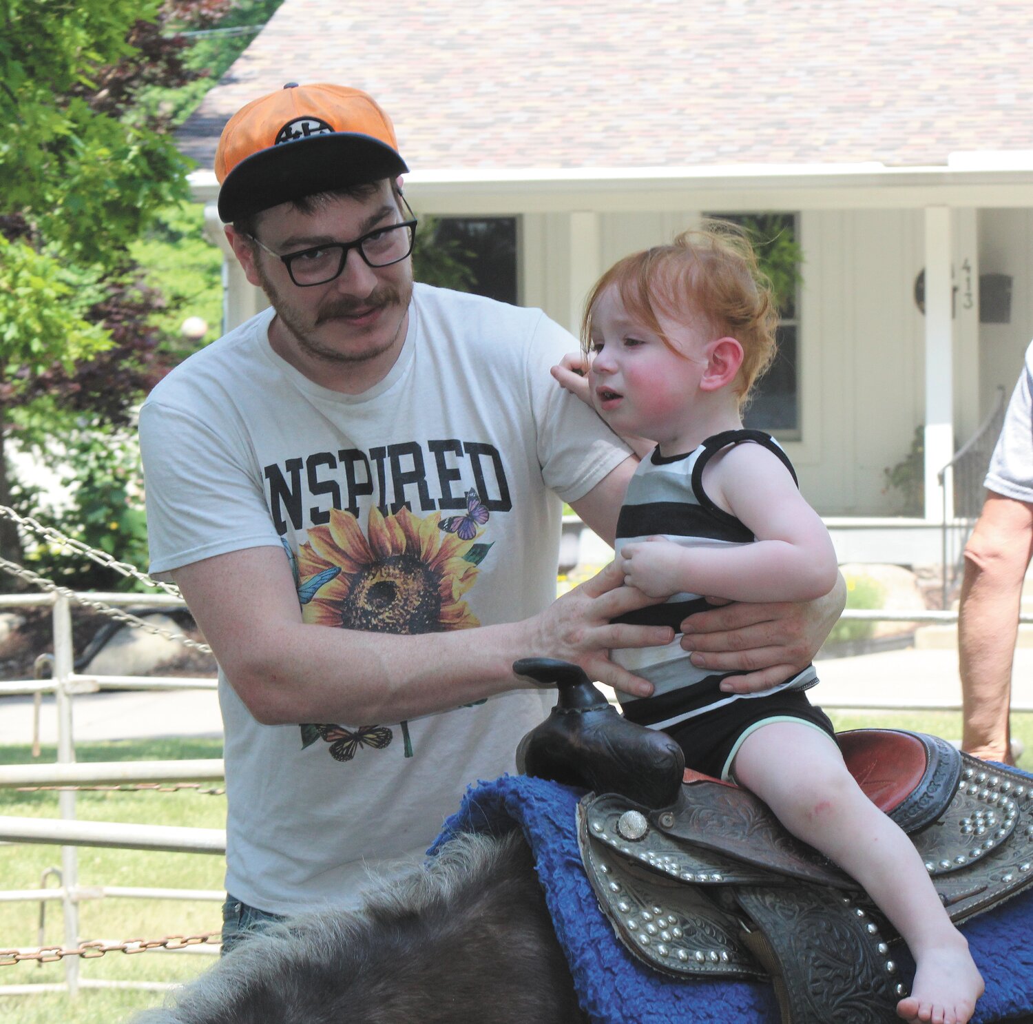 Sam Cline, 2, wasn't sure about his pony ride.