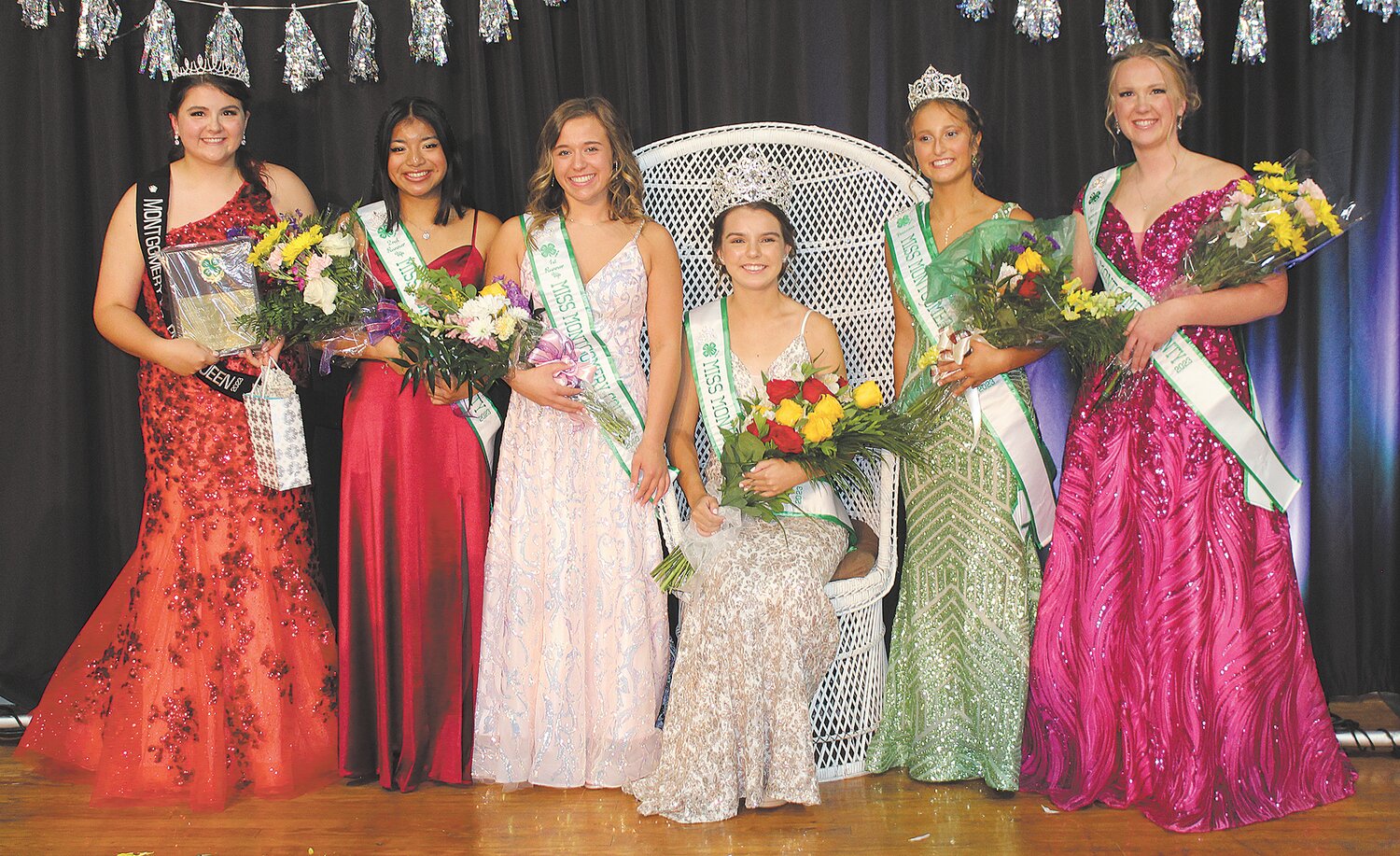 Sydney Niedeffer, seated, was crowned the 2023 Miss Montgomery County on Saturday at the 4-H Building. She is pictured with, from left, Elizabeth Cain, who earned the Elaine Chambers Award; second runner-up Abigail Sayler; first runner-up Halle Elliott; Miss Congeniality and Montgomery County Princess Peri McClaskey; and princess runner-up Kylee Reeves.