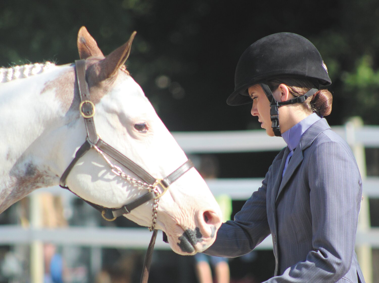 Chelsea Veatch shows her horse Friday during the English Horse Show.