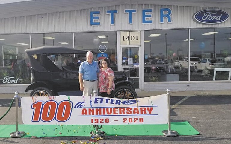 Jeff and Sandy Etter pose outside the dealership during the 100-year anniversary event. The Etters are retiring and have sold the business to Mike O’Daniel. Beginning Tuesday the company will operate as D-Patrick Crawfordsville.