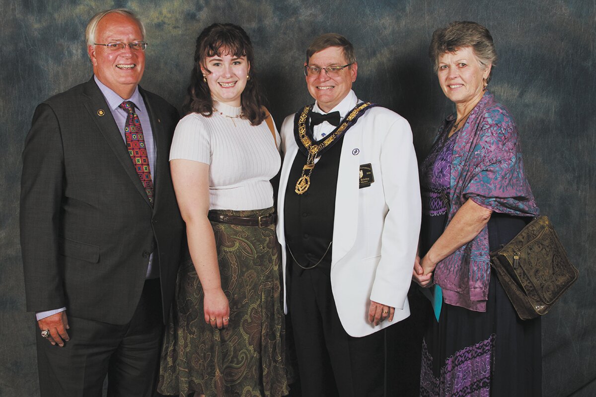 Incoming Butler University junior Abigail Eutsler (second from left) of Linden, was named an Indiana Scholar by the Grand Lodge of Indiana Scholarship Board for the third consecutive year. The scholarship was presented by Most Worshipful Grand Master Gary E. Brinley (third from left), of the Grand Lodge of Indiana Free & Accepted Masons during a scholarship recognition program and reception held in the Ancient Accepted Scottish Rite Valley of Indianapolis Cathedral.  lso attending were her parents, Mark Eutsler, Past Master of the former Linden Lodge 697 F. & A.M., and Therese Eutsler. Abigail is pursuing a bachelor's degree of music in the Jordan College of the Arts in vocal performance and choral music education. She is also the recipient of the Abbott Scholarship from the Scottish Rite, Northern Masonic Jurisdiction.