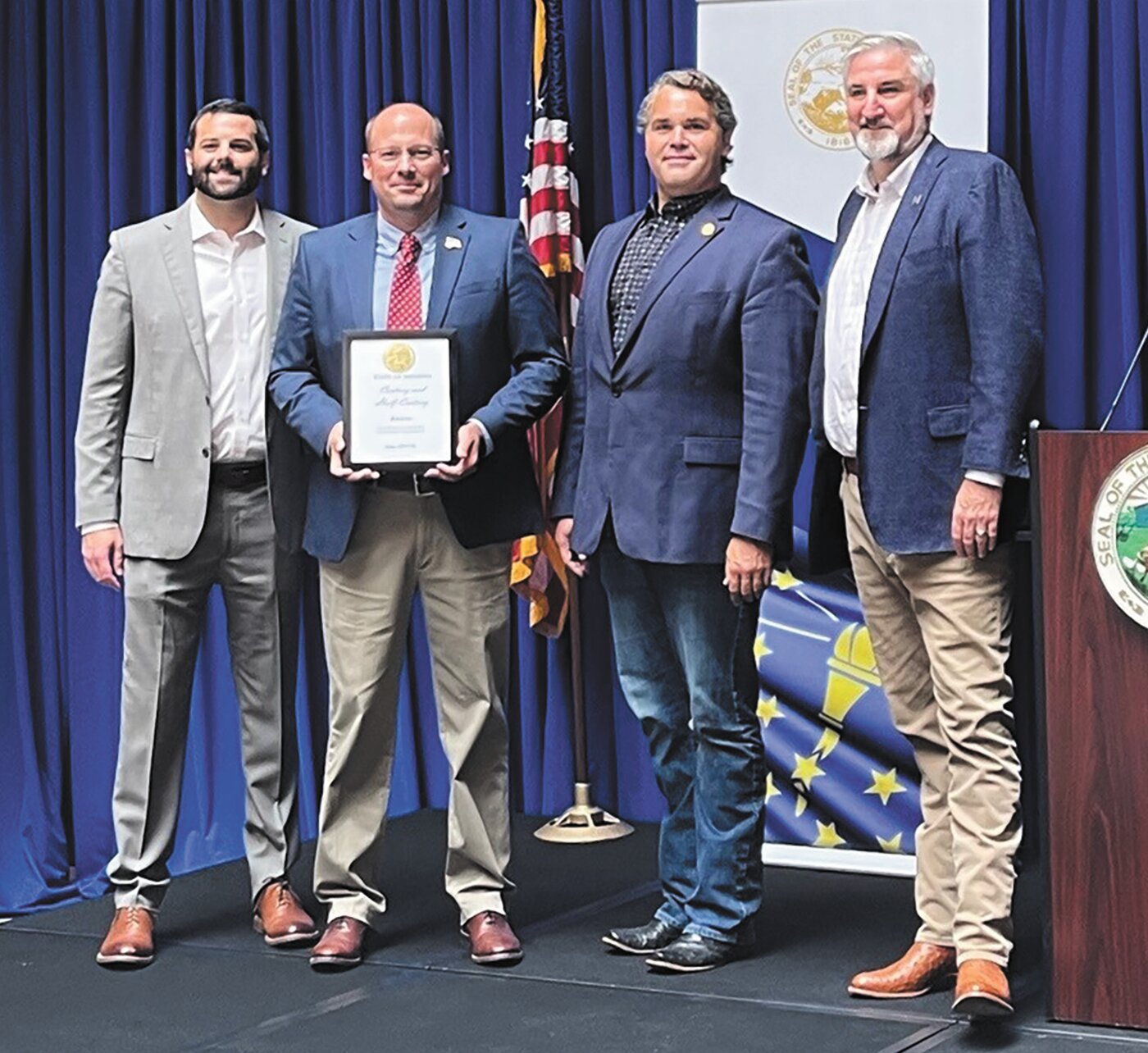 Pictured from left are David Rosenberg, IEDC Chief Operating Officer and Chief of Staff, Matt Howrey, North Salem State Bank President and CEO, Beau Baird, State Representative District 44 and Indiana Gov. Eric Holcomb.