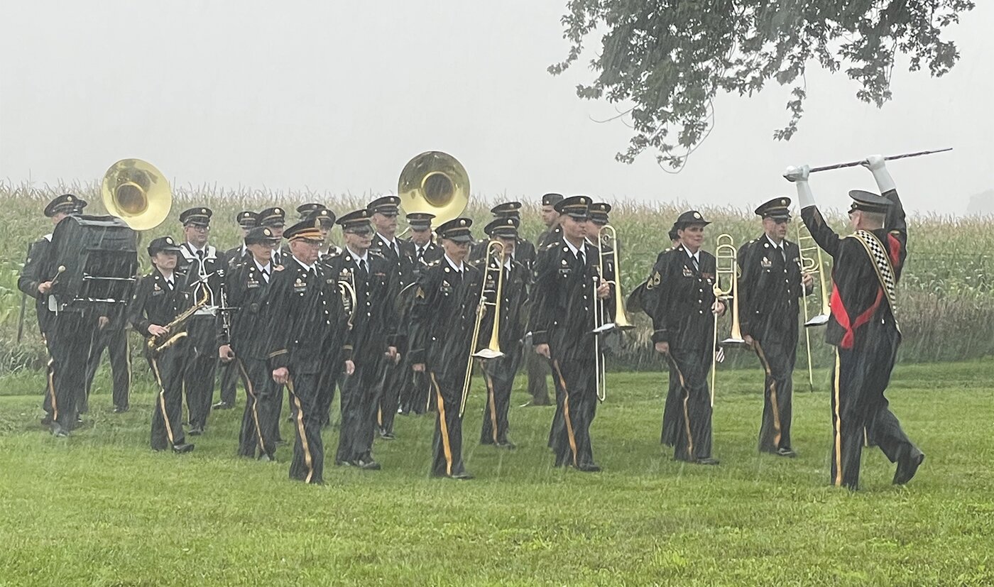 Members of the Indiana National Guard Band lead the help lead the procession to the cemetery.