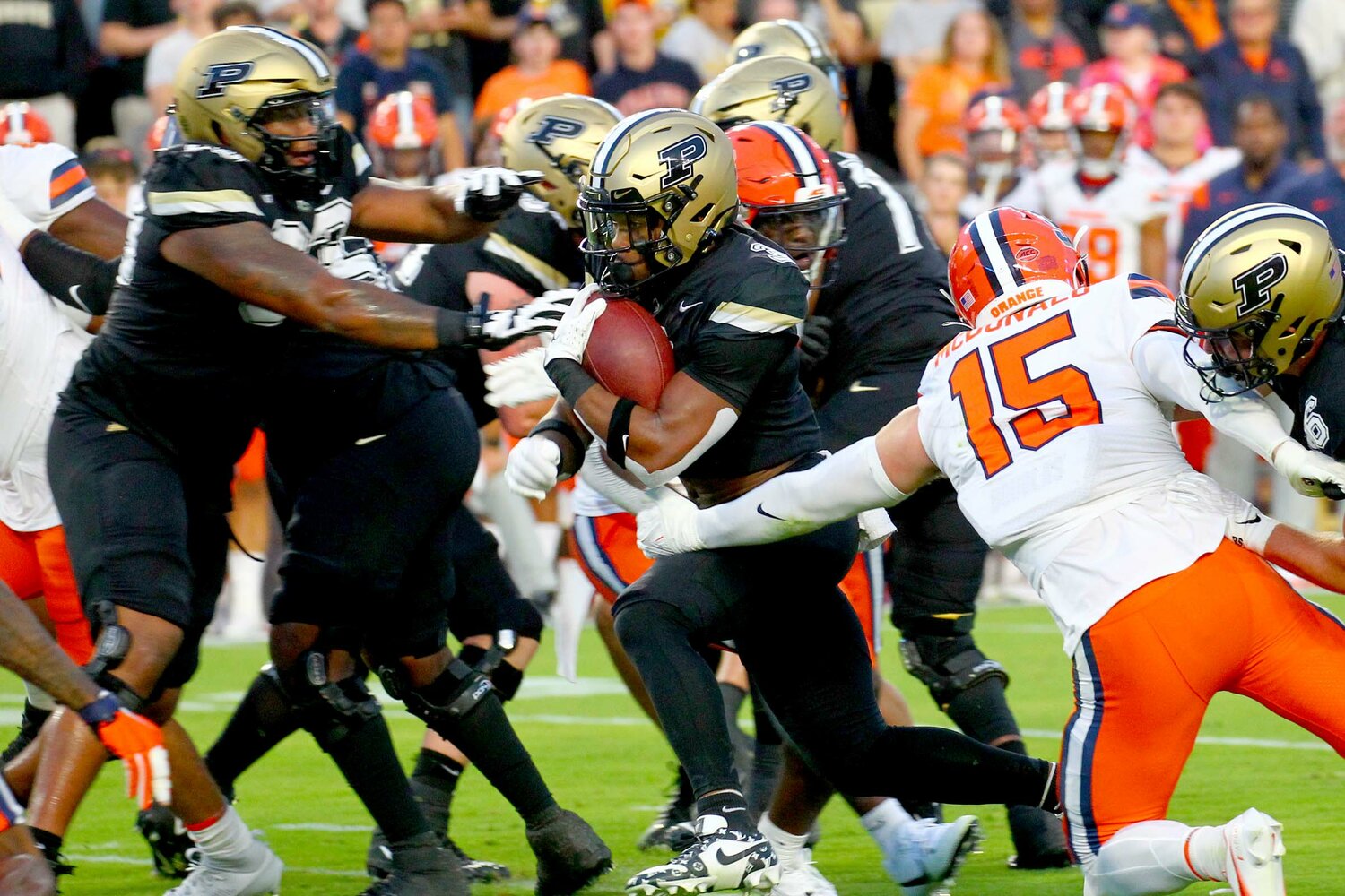 Tyrone Tracy of Purdue - running through a hole for a 9-yard gain