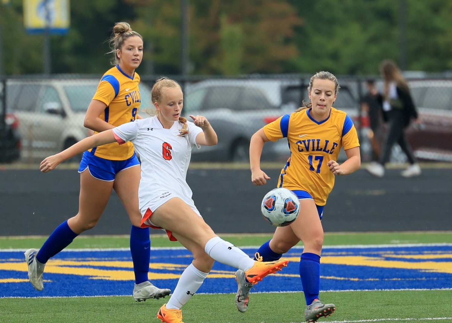 North Montgomery's Ava Nunan fires a ball downfield for the Chargers.