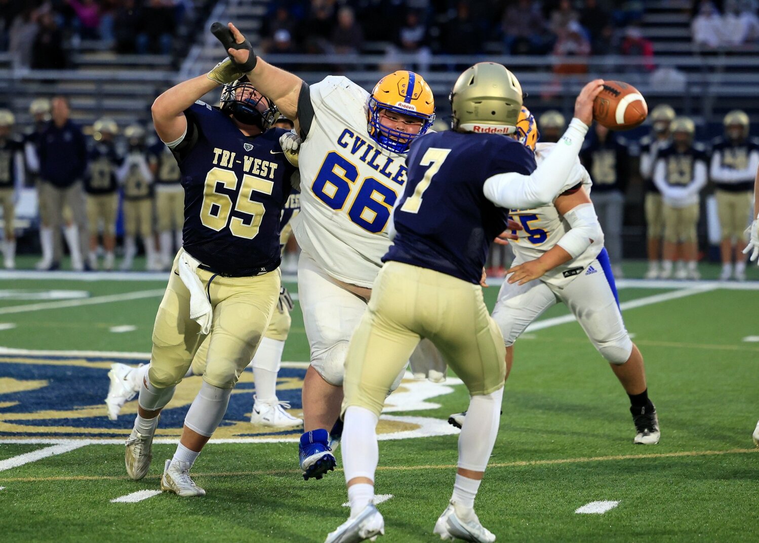 Cville's Reese Busenbark applies pressure to Tri-West QB Malachi Walden during the Bruins 41-0 win on Friday.