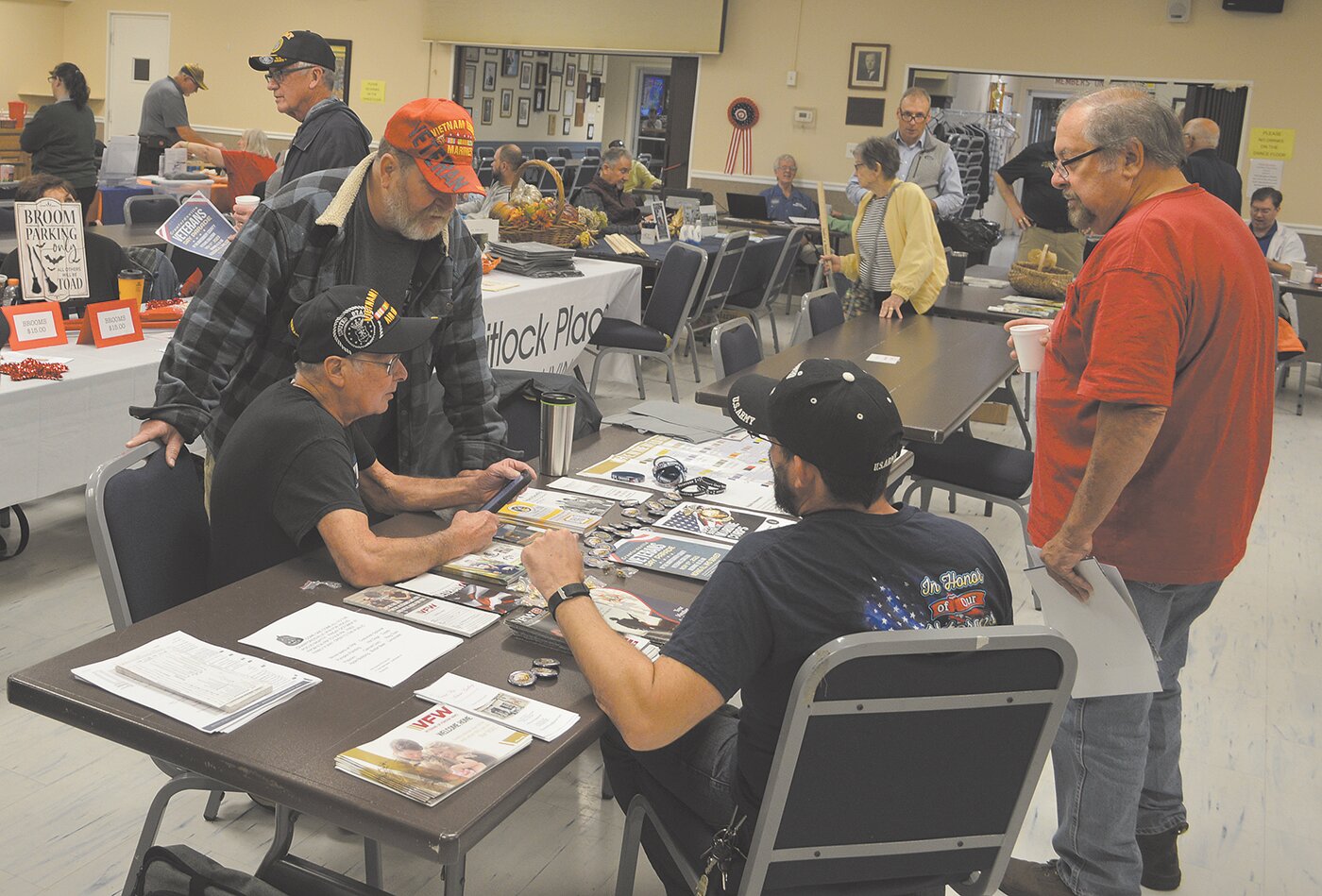 Several people gather Thursday at the Byron Cox American Legion Post 72 for the annual Veterans Expo. Vets and their spouses were offered breakfast, eye exams, flu shots and opportunities to visit with representatives from several community service organizations.