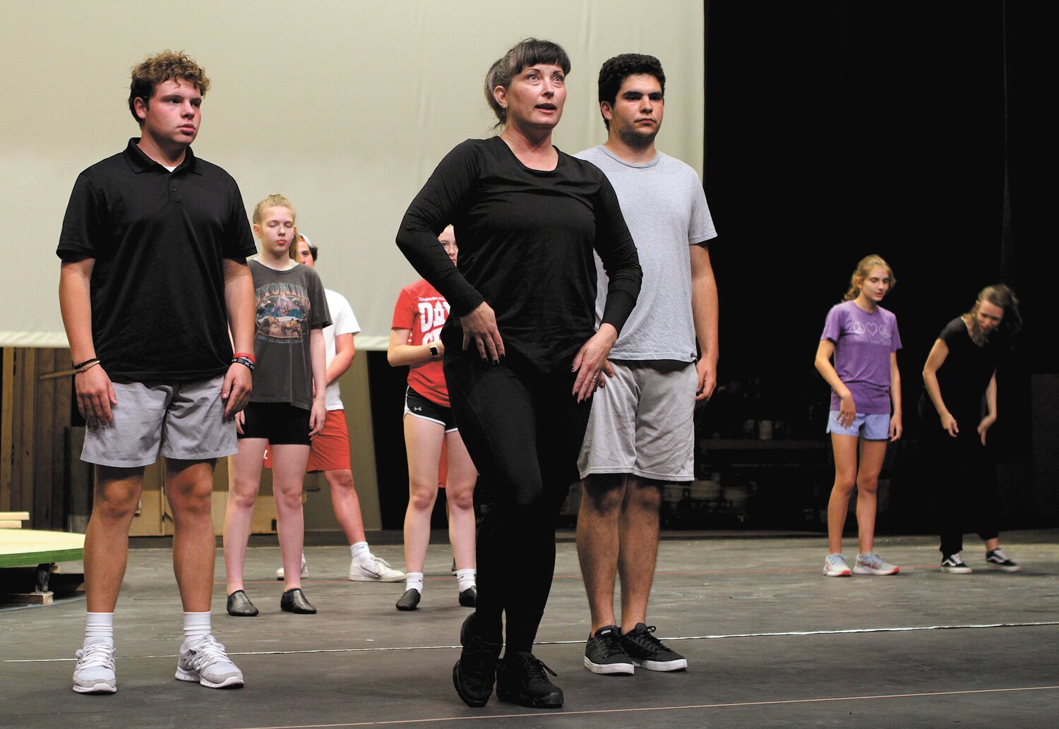 Choreography Kathleen Hickey leads the cast through a recent rehearsal.