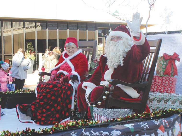 Santa and Mrs. Claus spread holiday cheer during the 2022 Christmas parade.