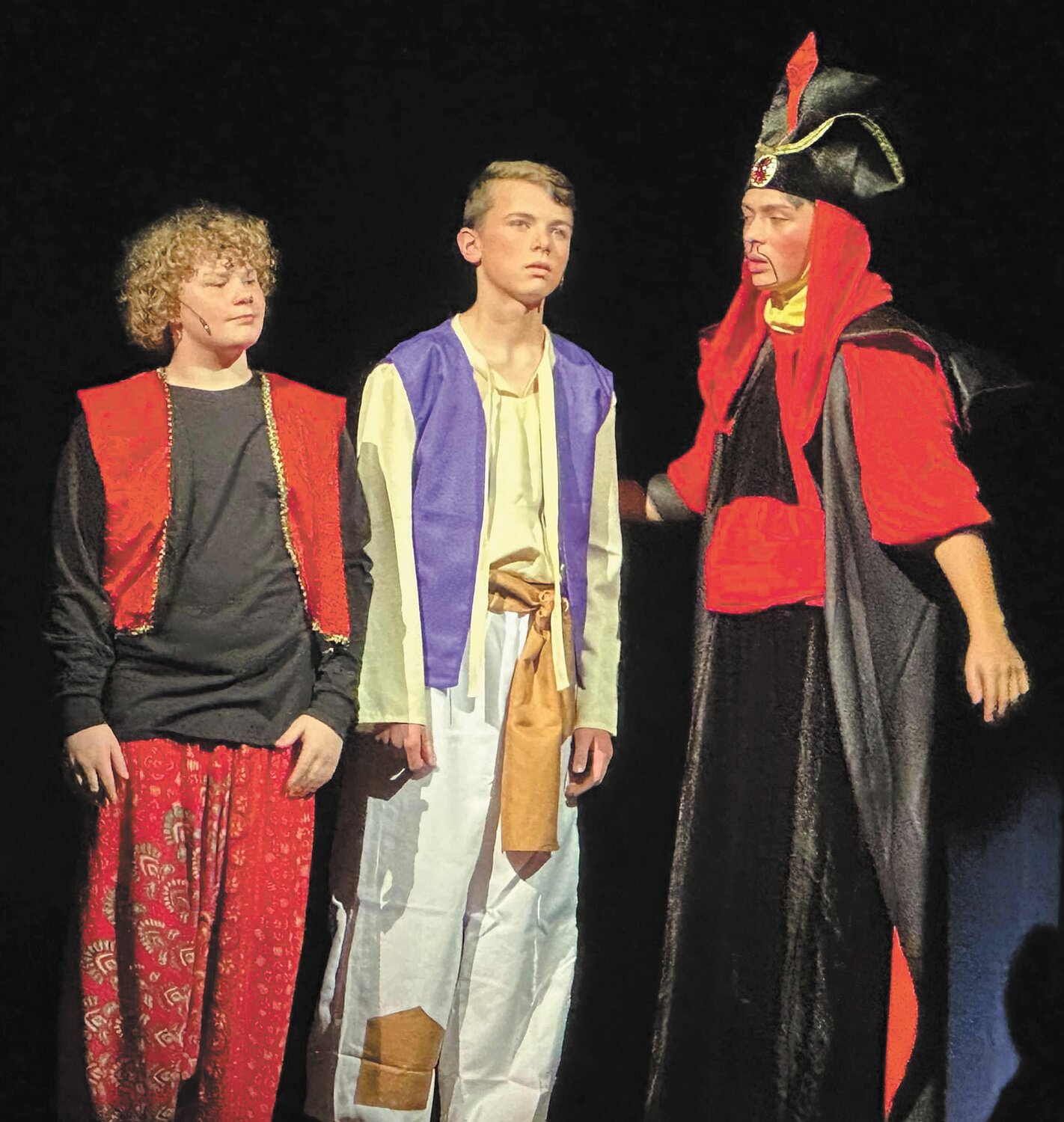 Caden Tyo (Iago), Ben Oppy (Aladdin) and Nathan Purcell-Sanchez (Jafar) rehearse a scene.