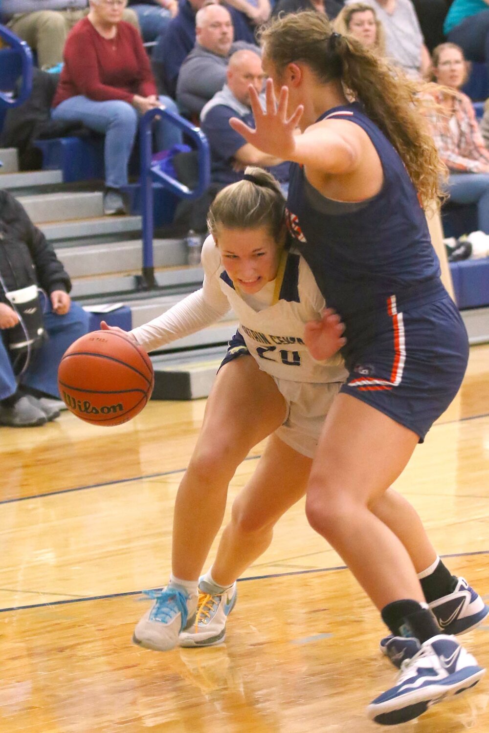 Hannah Prickett of Fountain Central - driving into Piper Ramey of North Montgomery