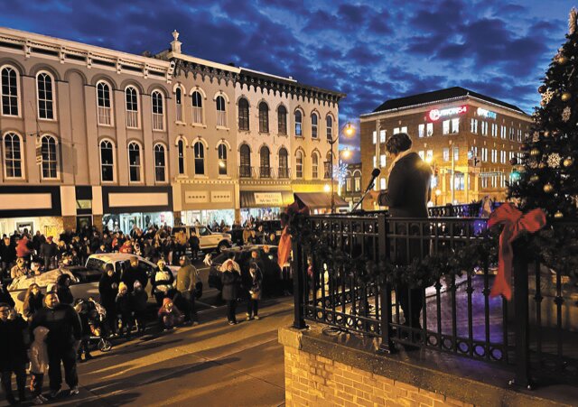 A crowd gathers on East Main Street to witness the tree-lighting ceremony during Downtown Party Night.