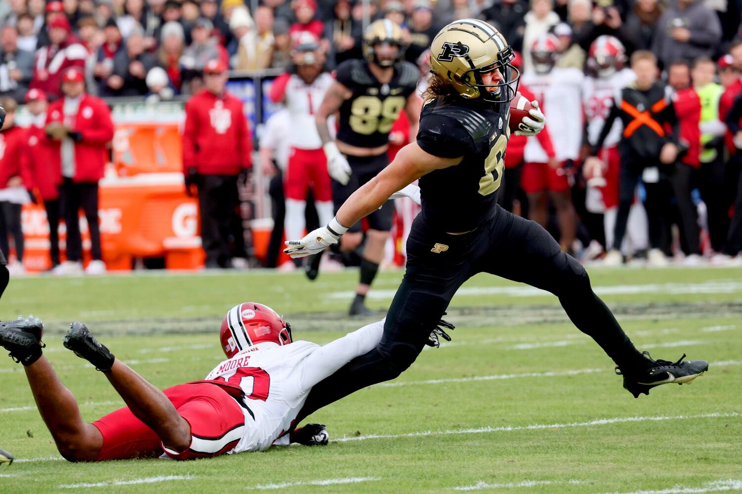 George Burhenn of Purdue - breaking free from tackle attempt by Louis Moore of Indiana for 33-yard touchdown catch and run