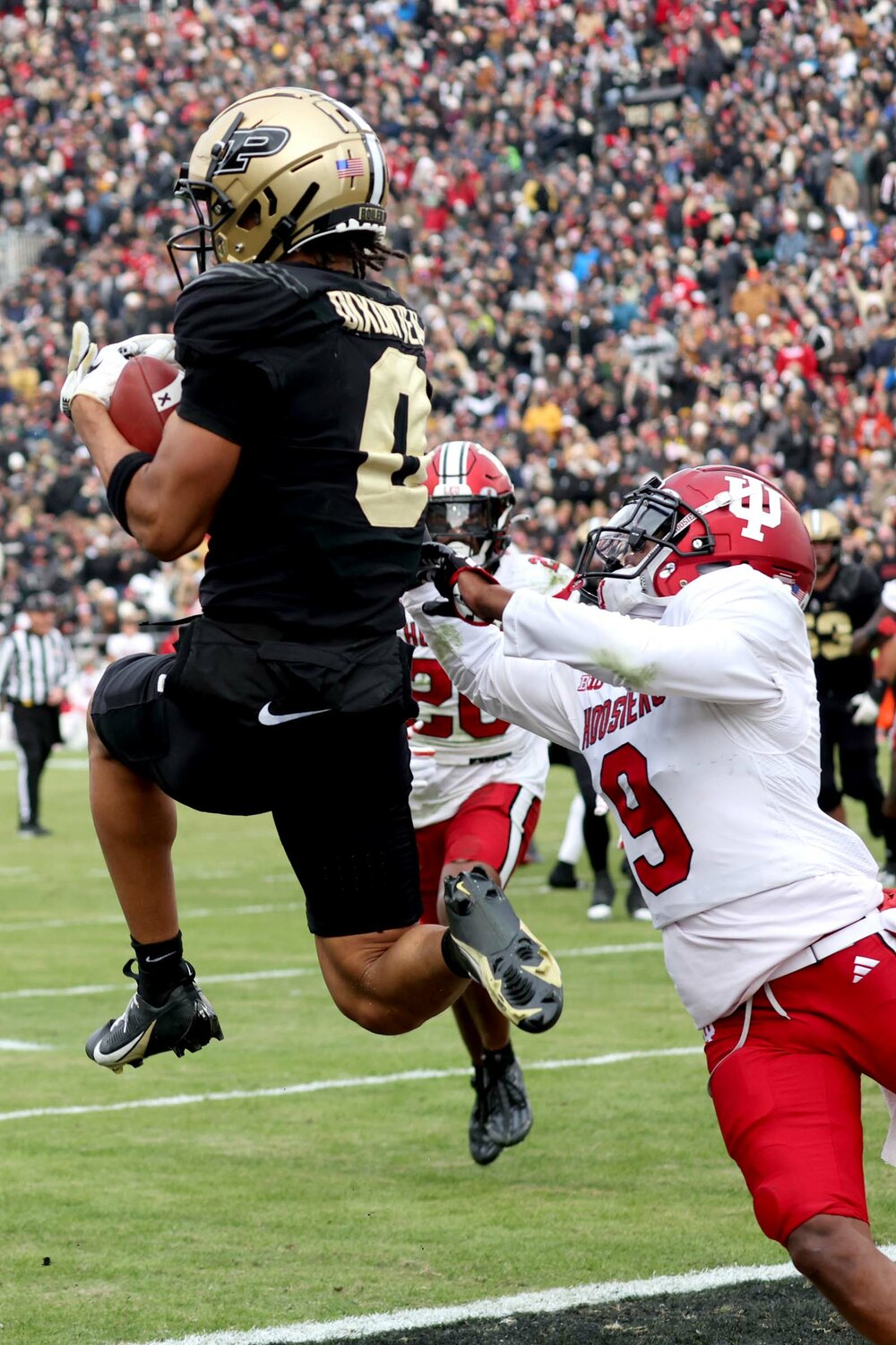 Jamier Johnson of Indiana - driving Jayden Dixon-Veal of Purdue out of bounds for an incompletion