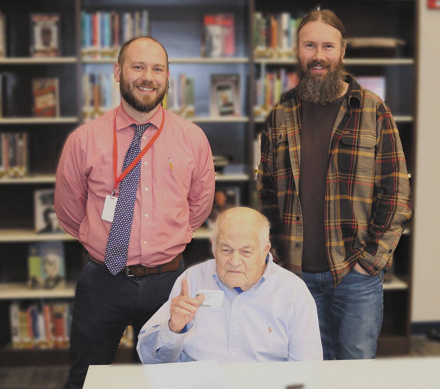 Joe Allen, seated, made a recent visit to North Montgomery High School. He is pictured with Andrew Showers, left, and Kevin Brooks. Allen is a Crawfordsville native who was a capsule communicator tasked with sending messages from the ground to the Apollo 11 moon landing crew, which included Neil Armstrong, Michael Collins and Edwin “Buzz” Aldrin. Allen was on the astronaut support crew for Apollo 15 in 1971 and returned to space aboard the Discovery in 1984. After retiring from NASA, he led a commercial space company and was chair of a defense contractor. He resided in Washington, D.C. for many years, then returned to Crawfordsville, where he now resides.
