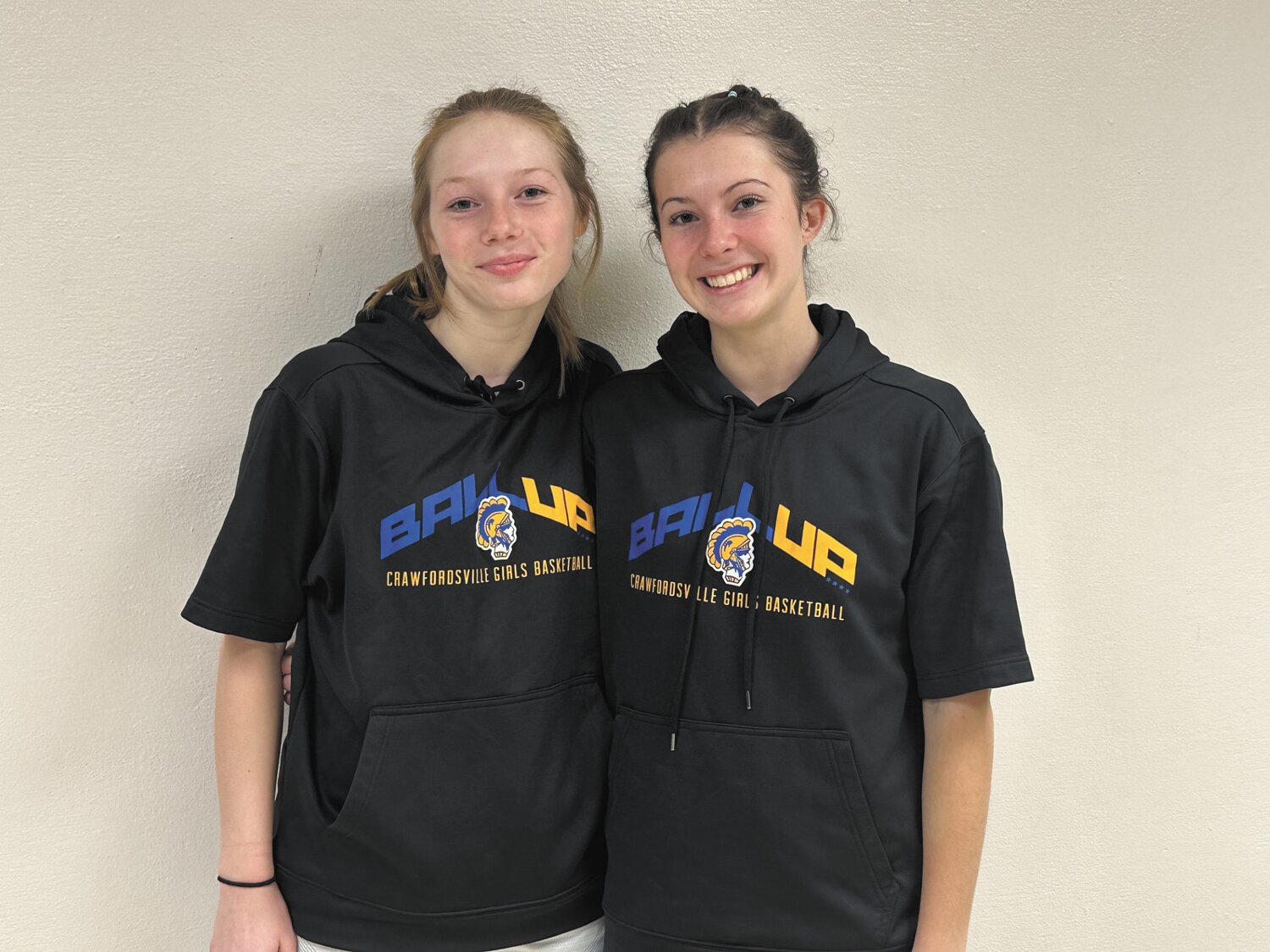 Sister’s Olivia (left) and Madi Hedrick (right) are getting a rare opportunity to play basketball together with Crawfordsville this season. Both are starters for the 
Athenians with Olivia being a sophomore and Madi a senior.