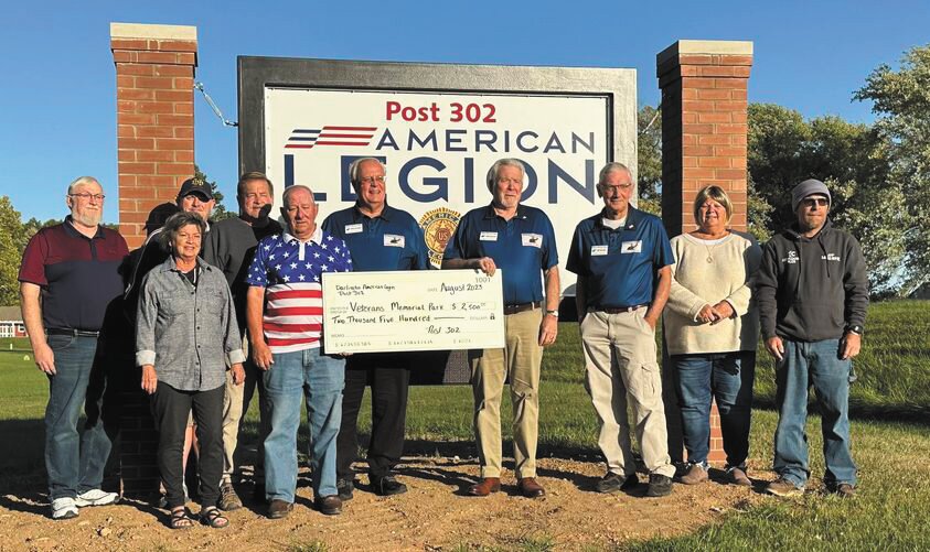 American Legion Post 302 in Darlington recently donated $2,500 to the Veterans Memorial Park being established in Crawfordsville. Pictured are Sons of the American Legion Member Paul Dowell Jr., Auxiliary President Donna Weliever Miller, SAL Member John Roche, SAL President Rich Maxwell, Commander Dave Wright, VMP Board Advisor Mark Eutsler, VMP Vice President Mike Spencer, VMP Board Member Bill Durbin, Club Manager Kim Lough Carpenter, Past Commander Jeremy Weliever. Donations of any amount are being accepted and sponsorships are still available.  More information is available by contacting the park at veterans.memorial.47933@gmail.com.
