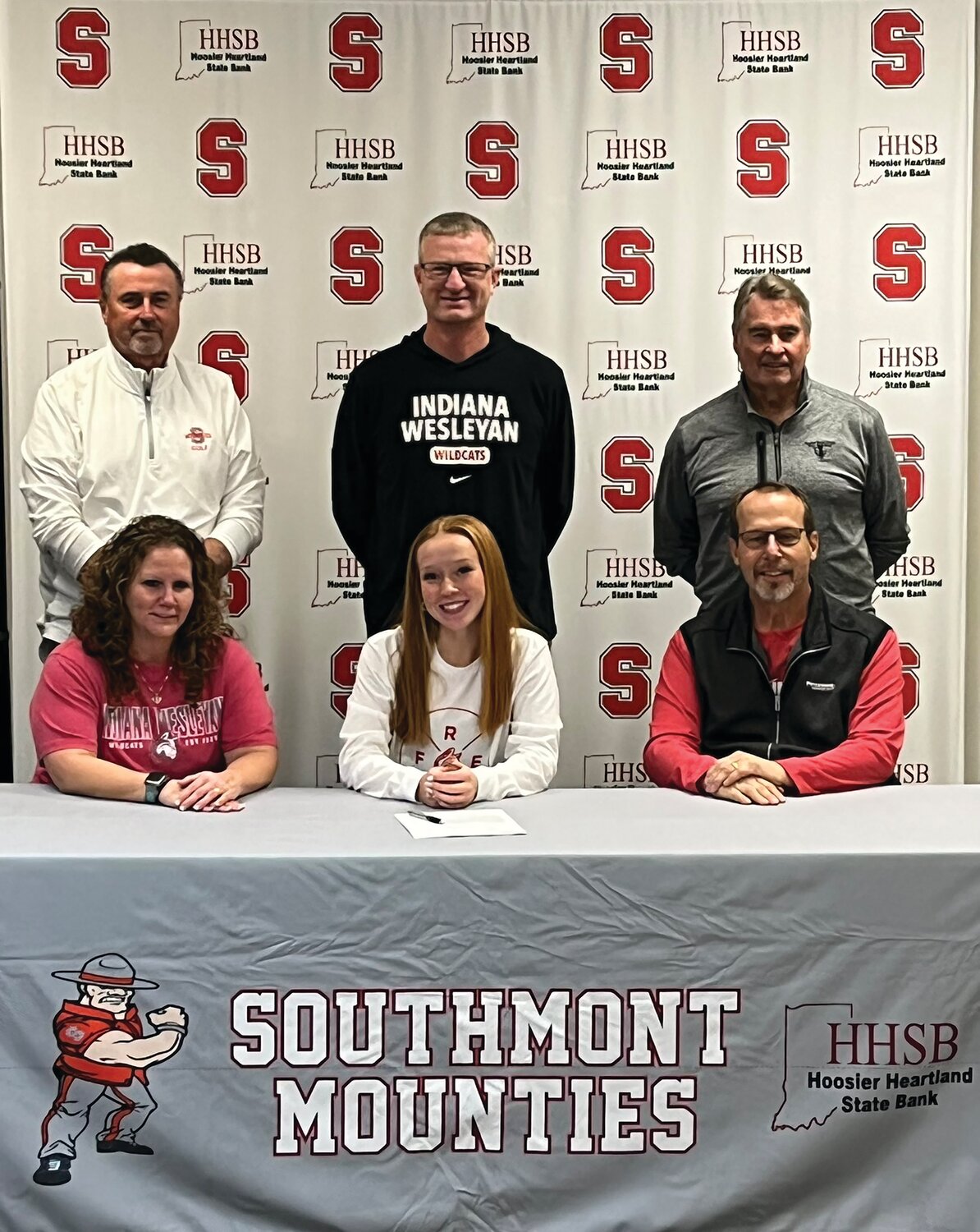Southmont’s Addison Meadows made it official on Wednesday by signing with Indiana Wesleyan to continue her golf career. Pictured from L-R include: Mother Jennifer Meadows, Addison Meadows, and father Larry Meadows. Back Row L-R: Southmont coach Bill Whalen, Indiana Wesleyan Coach Kyle Bloom, Southmont assistant coach Dave Williamson.
