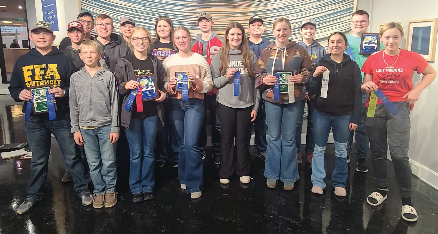 Front row, from left, Hunter Thompson, Grant Reeves, Natalie Rhoads, Kylee Reeves, Danika Ward, Emily Simpson, Lennon Woods and Cassidy Dittmer; and back row,  Trent Reeves, Coach Gary Mosbaugh, Caden Allen, Daniel Simpson, Kelsey Thompson, Kale Vaught, Ethan Smith, Madelyn Roberts and Cole Rhoads.