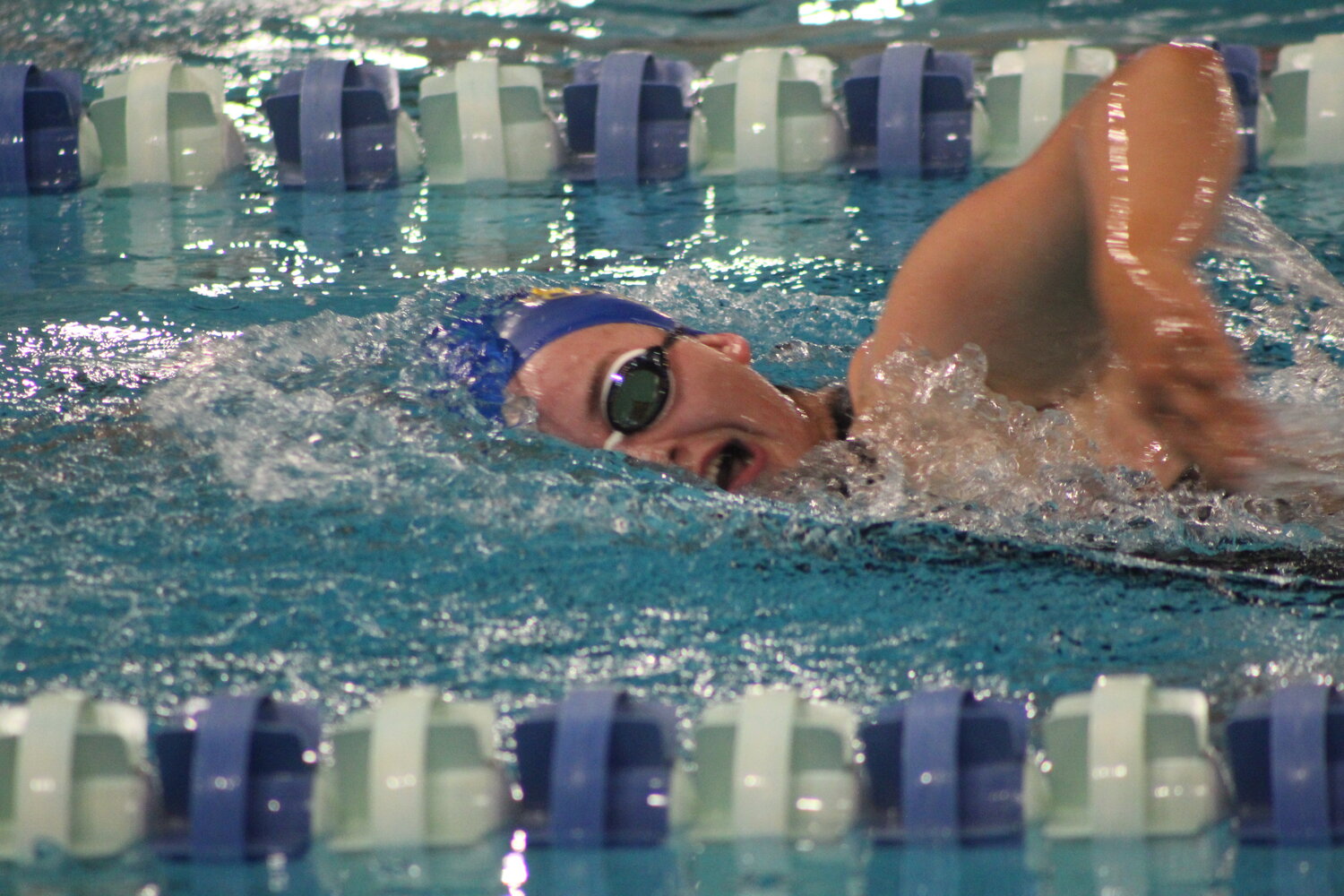 Marie Helser got her first taste of the county meet as she missed last year's meet as a freshman. Hesler won the 500 free along with the 200 freestyle and medley relays.