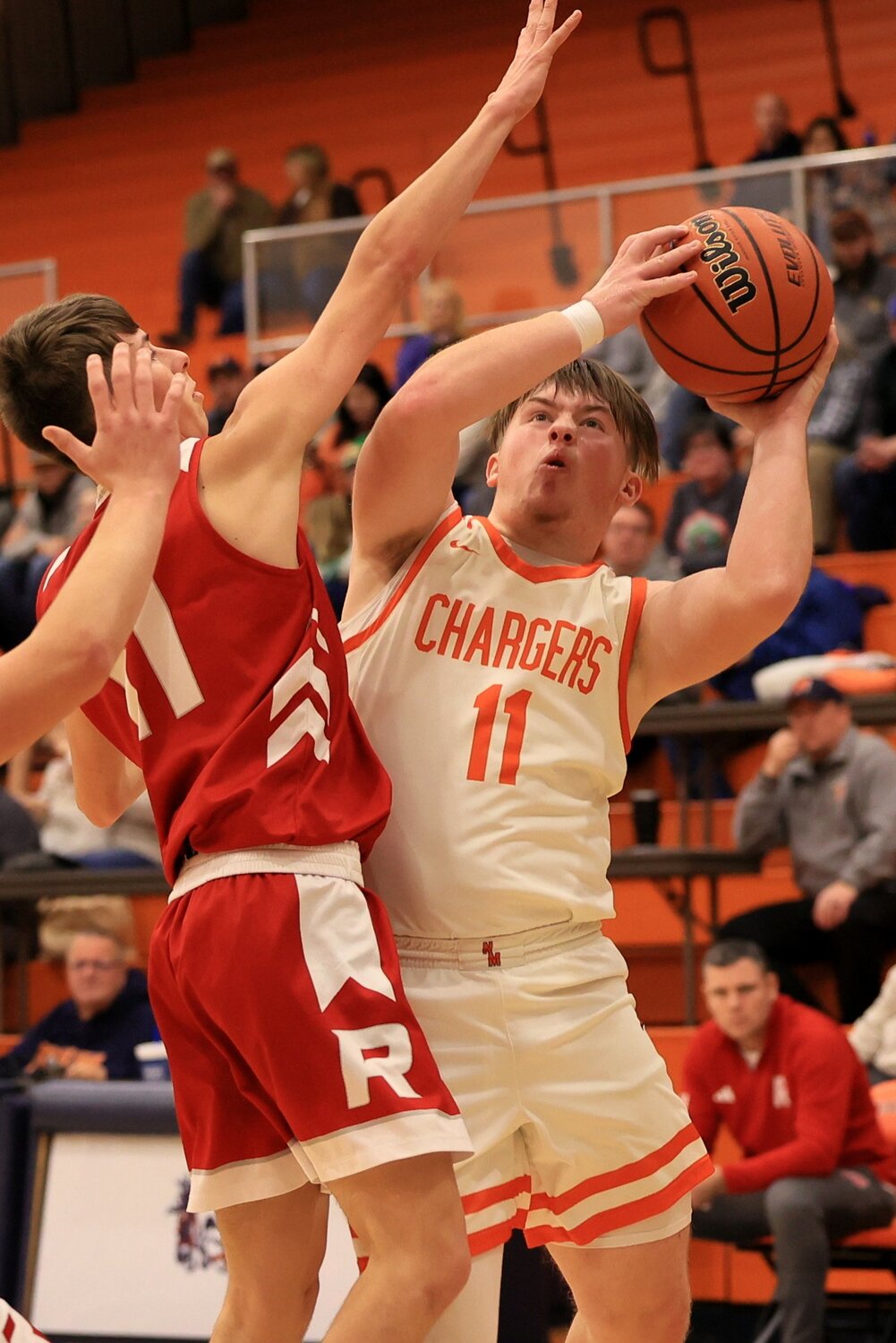 Ross Dyson attacks the basket as the senior got praise from Coach Chad Arnold for his play on the defensive side of the ball.