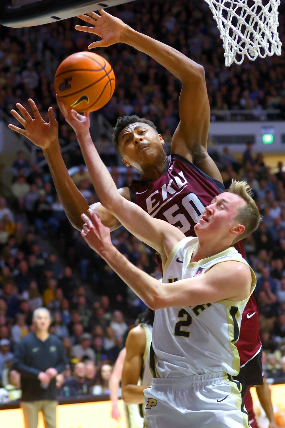 Fletcher Loyer of Purdue - going up for lay-up against Isaiah Cozart of Eastern Kentucky